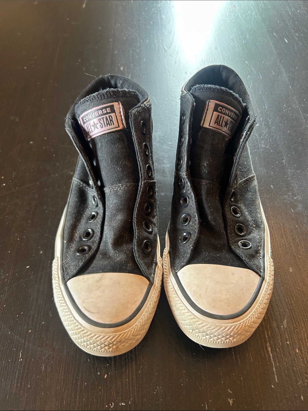 Converse Women’s Black Canvas High-Top Sneakers with White Toe